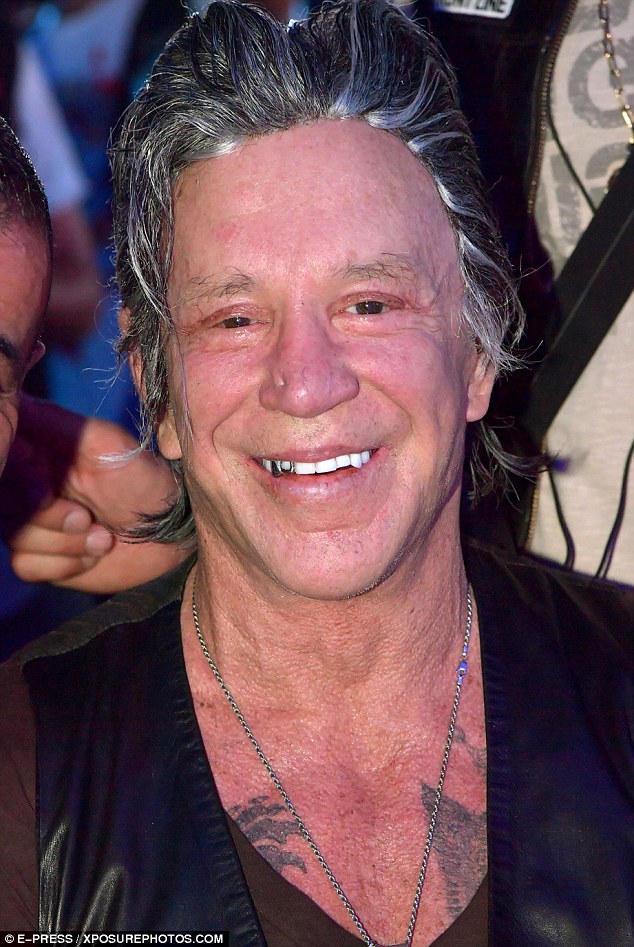 00578-3725504-Questionable_Mickey_Rourke_s_iron_grey_hairpiece_proved_to_be_a_-m-2_1470413551311.jpg