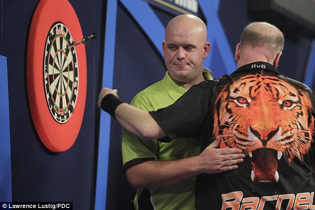 0578-3378184-Van_Barneveld_embraces_countryman_and_world_No_1_Michael_van_Ger-a-38_1451430512654.jpg