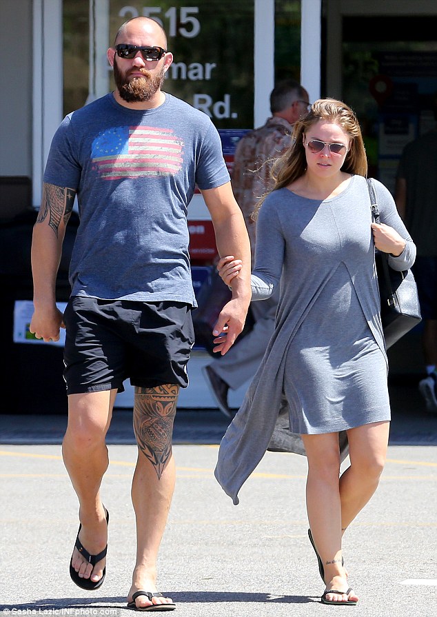 0578-3686455-Out_of_the_ring_Ronda_Rousey_and_boyfriend_Travis_Browne_spent_s-m-21_1468331778834.jpg