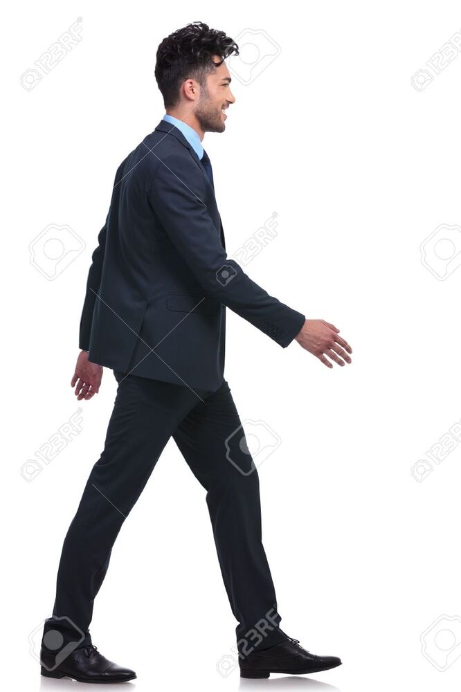 23528614-side-view-of-a-young-smiling-business-man-walking-forward.jpg