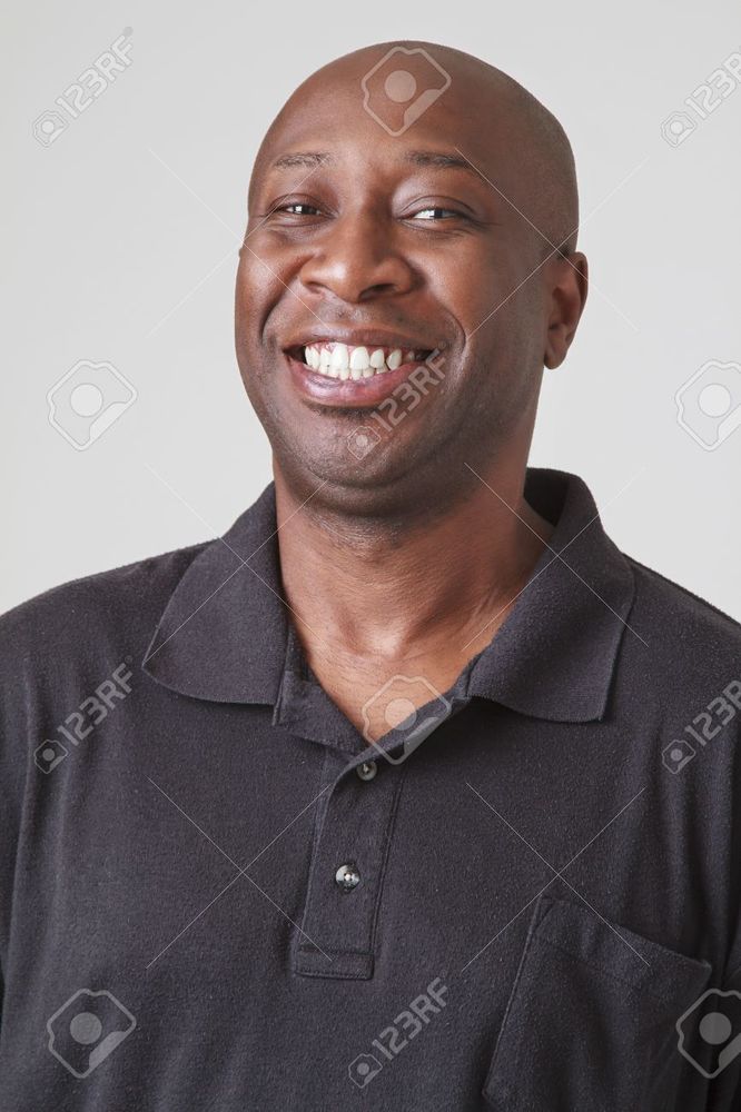 43623787-bald-black-men-in-his-forty-with-great-big-smile.jpg