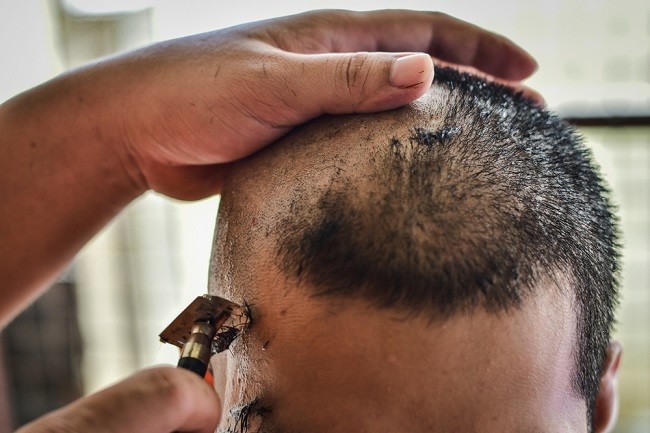 getting-head-shaved-with-razor.jpg