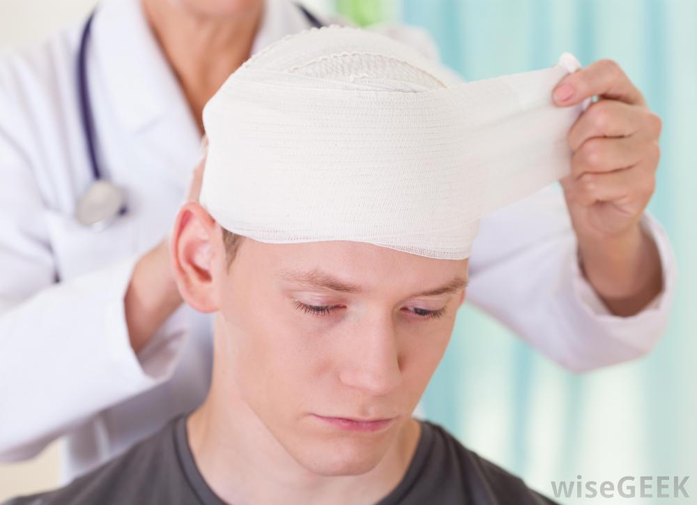 boy-getting-his-head-wrapped-in-bandages.jpg