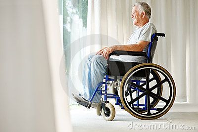disabled-old-man-wheelchair-looking-outside-15741379.jpg